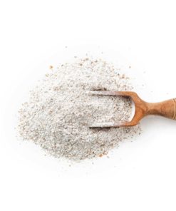 A wooden scoop full of rye flour