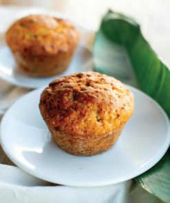 2 homemade Bali Buda banana and almond muffins on plates