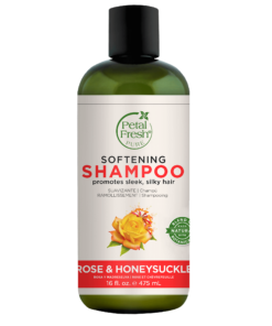A bottle of Petal Fresh Pure Rose and Honeysuckle Shampoo 475ml