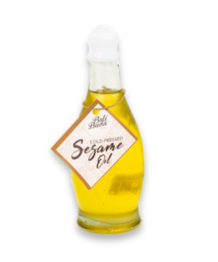 A bottle of Bali Buda cold-pressed sesame oil