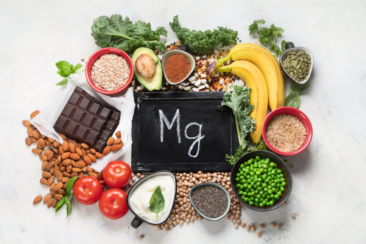 Magnesium symbol sign surrounded by magnesium-rich wholefoods
