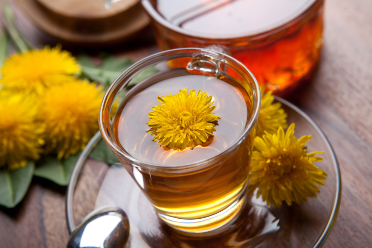a glass of warm herbal tea (chamomile)