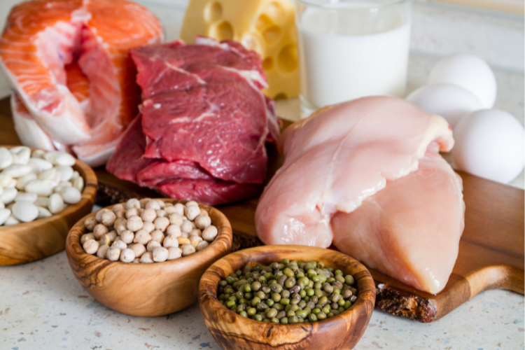 Animal and plant-based protein sources on a wooden board